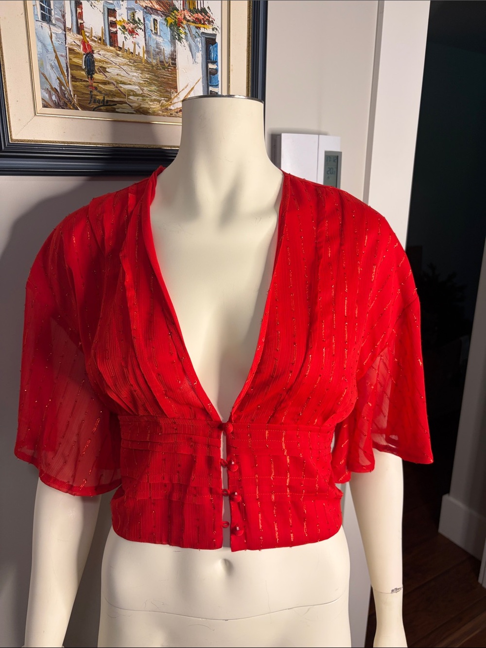 Artlove from Paris. Sheer flowy shirt with wide shirtsleeves and covered buttons